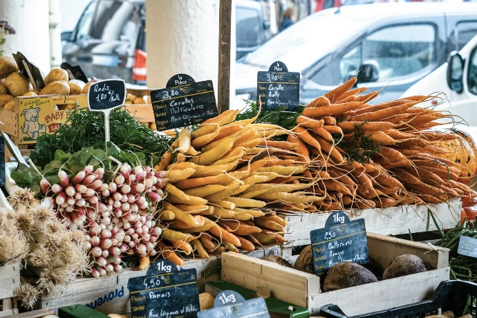 a market with vegetables and fruits